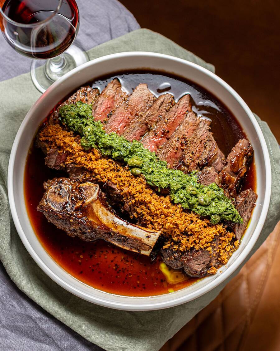 A sharing platter of steak and lamb rack at Estancia Adina